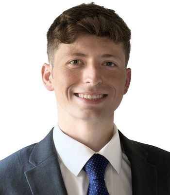 Portrait of Tyler VanAlstine, Real Estate Agent.